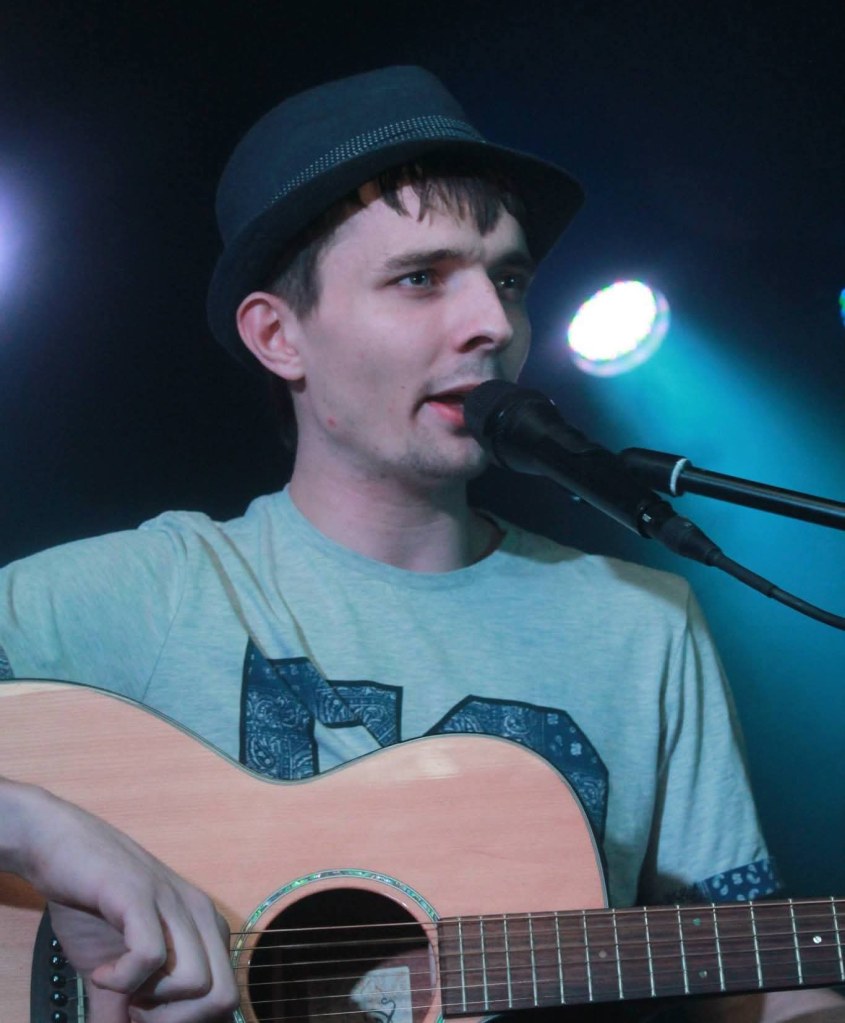 Brendon Ireland performing as an acoustic singer-songwriter
