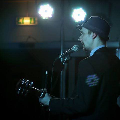 Brendon Ireland performing as an acoustic singer-songwriter